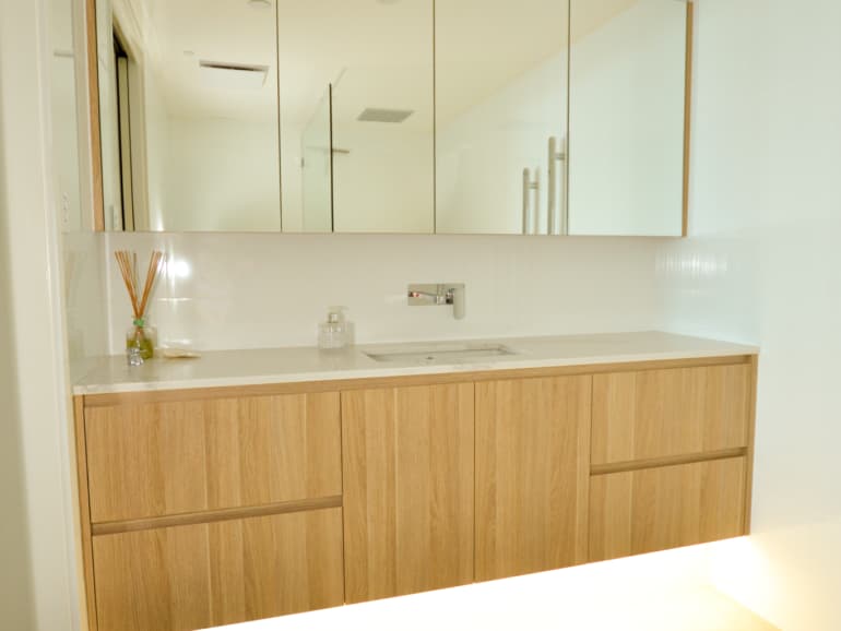 What Are the Best Small Bathroom Design Hacks to Maximize Space and Functionality?